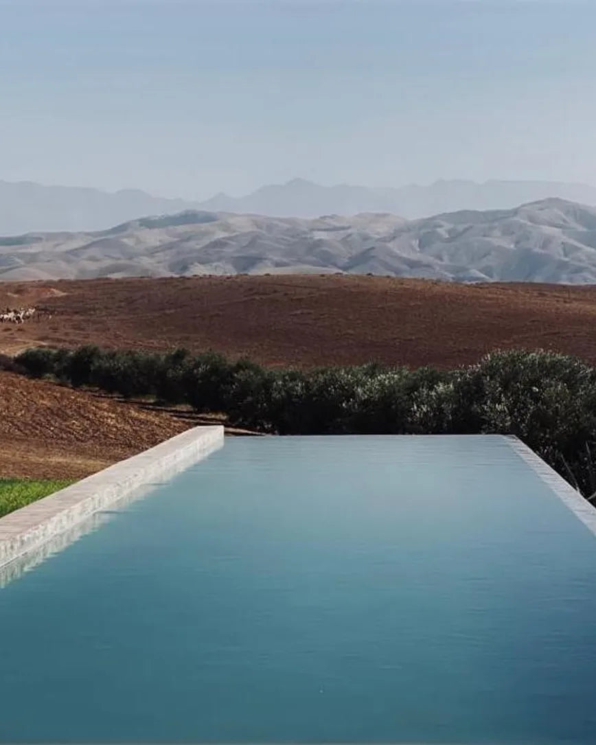 Villa K near Marrakech: a long terrace pool facing the Atlas Mountains